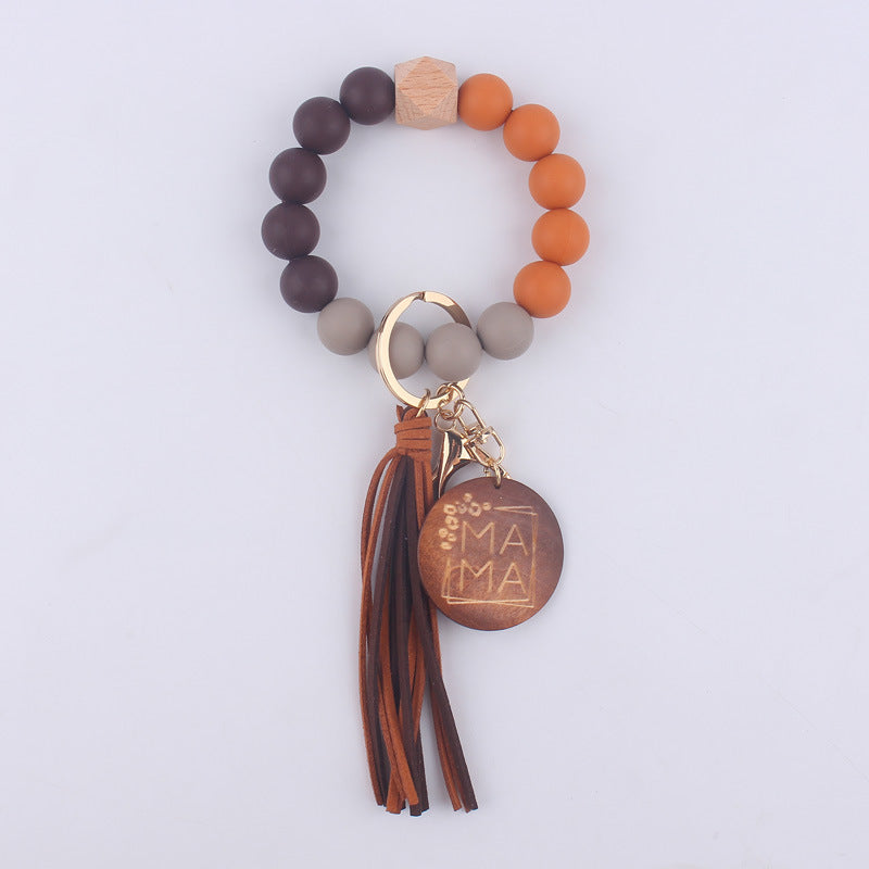 Wholesale MAMA Beaded Tassel Silicone Wrist Keychain